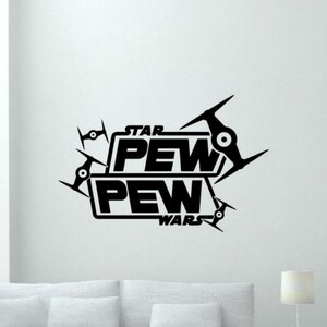 May include: Black and white Star Wars themed wall decal with the text "Star Pew Pew Wars" and several TIE fighter silhouettes.