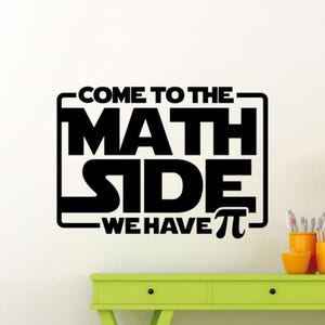 May include: Black and white wall decal with the text "Come to the Math Side - We Have Pi".