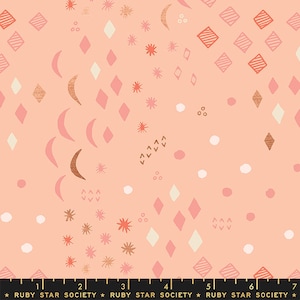 May include: A peach-colored fabric with a repeating pattern of pink, white, and gold geometric shapes, including diamonds, stars, and crescent moons.
