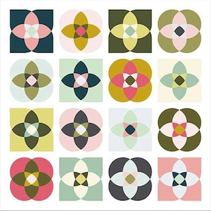 Może przedstawiać: Zestaw trzech ceramicznych kubków z nakrapianym, matowym wykończeniem. Kubki są w odcieniach kremu, jasnoszarym i ciemnoszarym. Każdy kubek ma prosty, minimalistyczny design i zaokrąglony uchwyt.