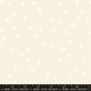May include: Pale cream fabric featuring a random pattern of white stars. The stars are of different sizes and are spread across the material. The fabric has a smooth, non-reflective surface, ideal for crafting and sewing.