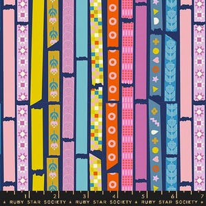 Puede incluir: Un patrón de tela con rayas verticales en varios colores, incluyendo rosa, amarillo, naranja y azul, sobre un fondo azul oscuro. Las rayas están decoradas con formas geométricas, motivos florales y círculos. El texto "RUBY STAR SOCIETY" está en la parte inferior.