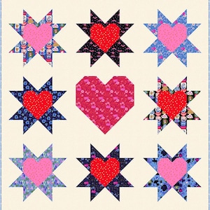 May include: A patchwork quilt featuring a repeating pattern of star-shaped blocks with heart centers. The stars have various patterned fabrics in blue, black, and floral designs. The hearts are pink and red. The quilt is set against a cream background.