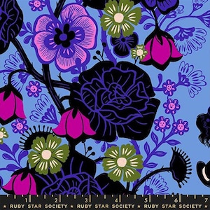 May include: A fabric pattern featuring a repeating floral design. The flowers are in shades of purple, pink, and green, set against a light blue background. Black outlines define the floral shapes. The text "RUBY STAR SOCIETY" is at the bottom.