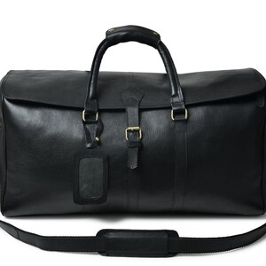 Handcrafted full-grain leather carry-on duffle with external pockets