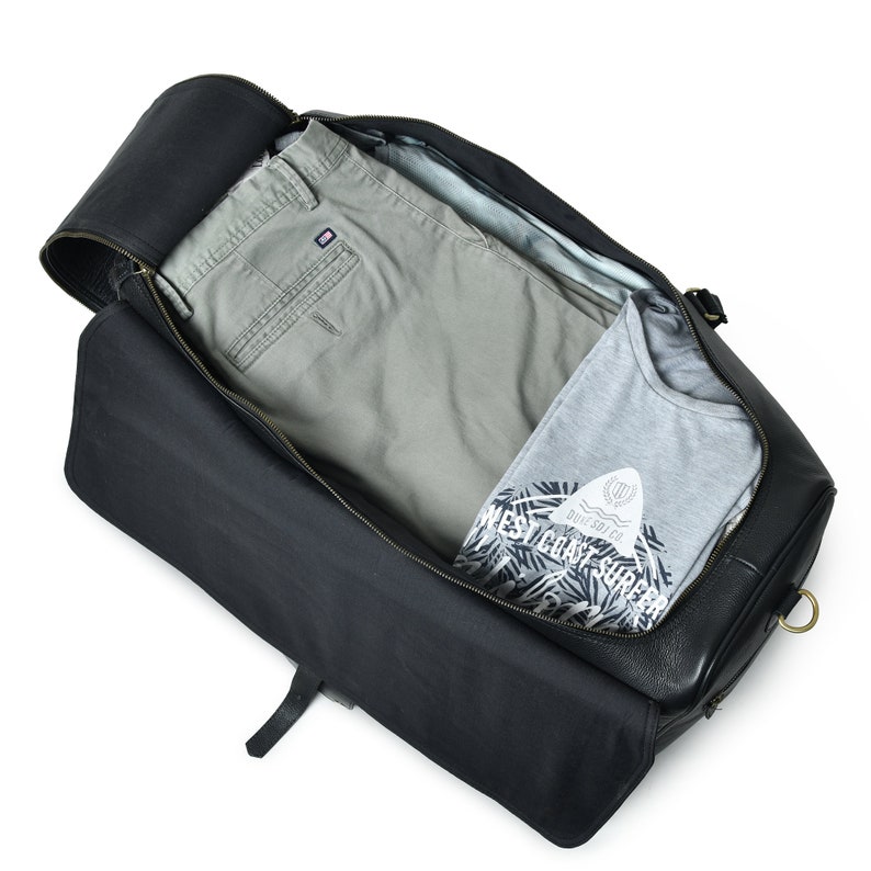 Interior view of leather weekender with compartments and lining