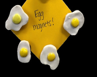 Egg magnets. Handmade polymer clay, cracked open egg magnet.