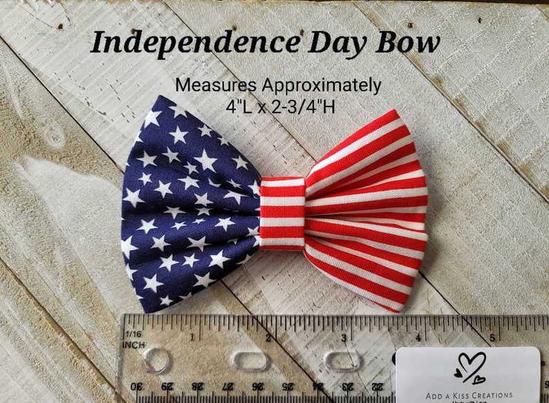 May include: A red, white, and blue bow tie with a star pattern on one side and stripes on the other. It measures 4 inches long and 2 3/4 inches high. Independence Day Bow.
