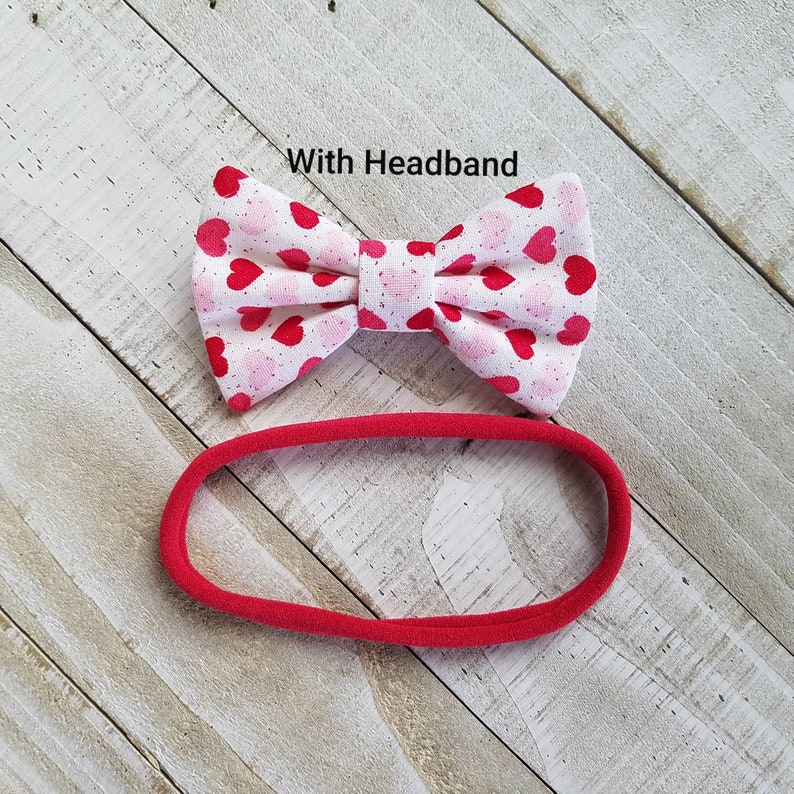 Infant Valentines Hair Bow with Hearts Skinny Nylon Headband or Clip Newborn Valentines Bow with Pink and Red Hearts and a touch of Glitter