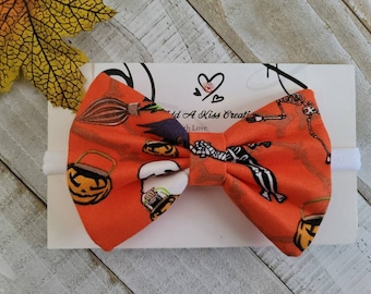 Pumpkin Halloween Hair Bow with White Color Skinny Nylon Headband, Made with Cotton Fabric, Measures Approximately 4"Lx2-3/4"H