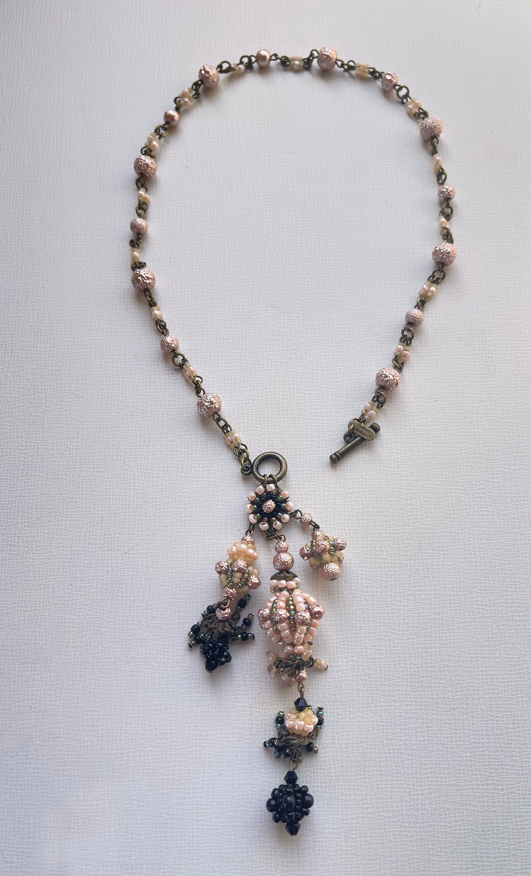 ヴィンテージ COLLEEN TOLAND ピンク ブラック トグル タッセル