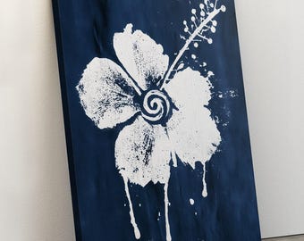 Stylized White Hibiscus Flower Canvas Print: Elegant Floral Wall Art on Dark Blue Background