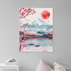 May include: A watercolor painting of Mount Fuji with cherry blossoms in bloom and a red sun in the sky. The mountain is reflected in a lake with two small boats.