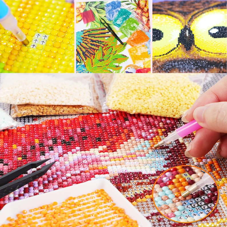 May include: Close-up of a diamond painting in progress. The image shows a colorful owl with bright yellow eyes. The canvas is covered in small, colorful diamonds, and a person is using a tool to place the diamonds. There are also small bags of diamonds in various colors.