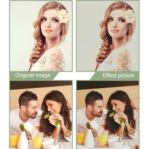 May include: Two people are sitting at a table, smiling and looking at each other. They are holding a white rose and there are two glasses of orange juice on the table.