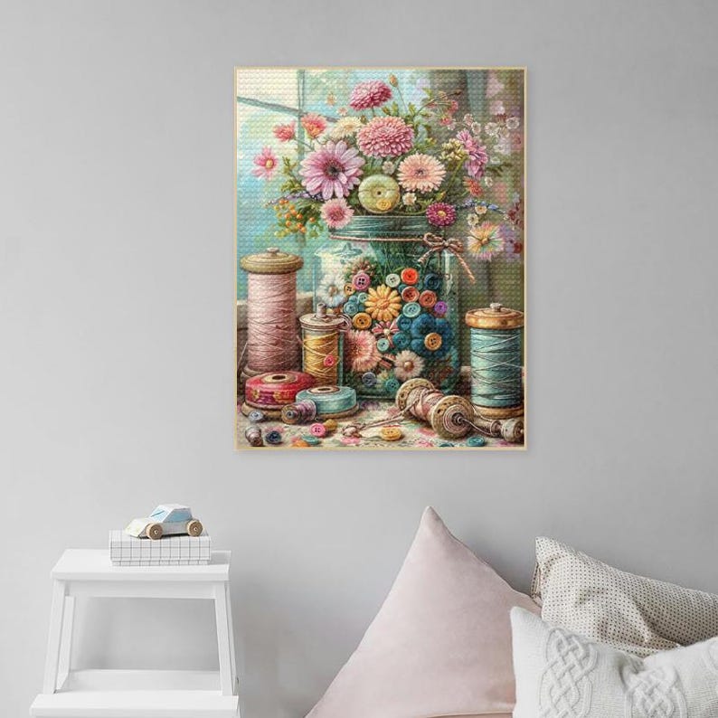 May include: A vintage-style painting of a glass jar filled with colorful buttons and flowers. The jar is surrounded by spools of thread and other sewing supplies.