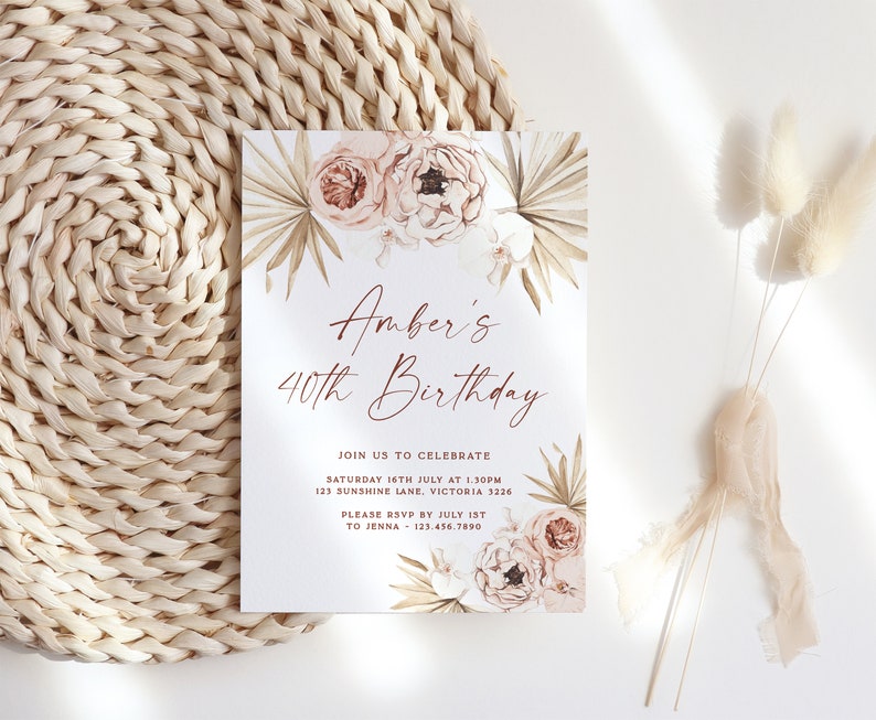 a white and pink floral wedding suite on a wicker place mat