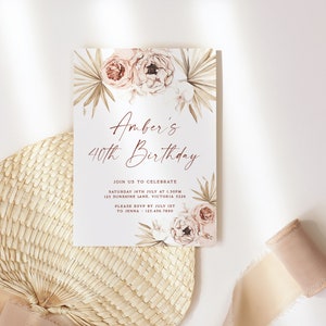 a white card with pink flowers on it