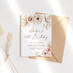 a white and gold birthday card with flowers on it