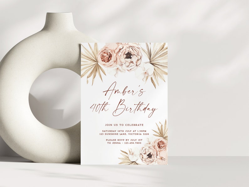 a white vase with a card inside of it