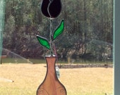 Deep purple tulip in vase