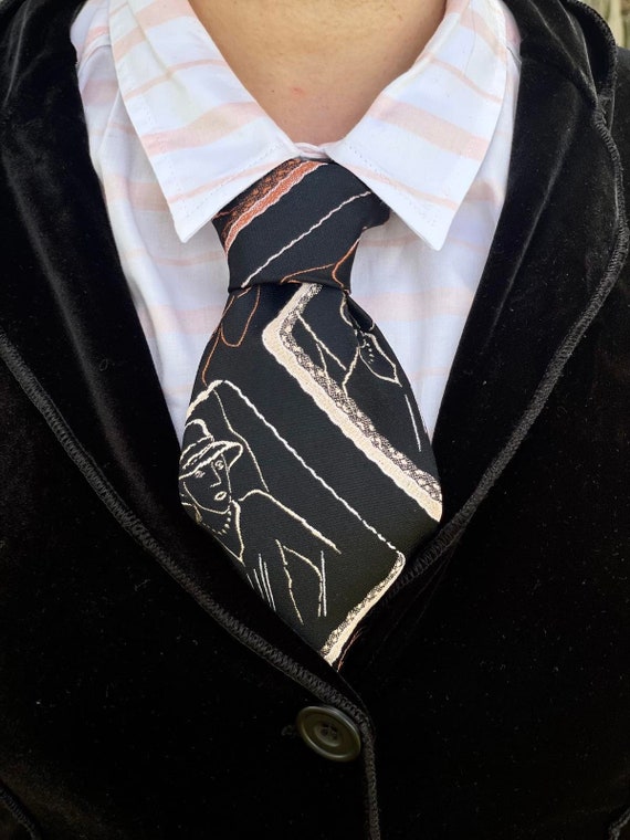 Corbata ancha negra dorada vintage de 1970 con siluetas enmarcadas Etsy Espana