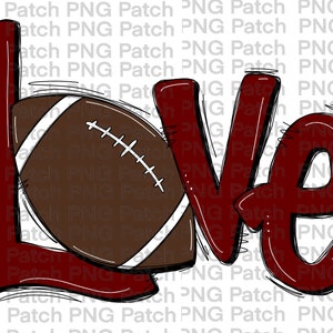 Op de afbeelding: Rood en wit "Love" met een bruine en witte voetbal in het midden van de "L".