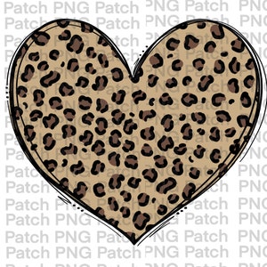 Puede incluir: Un corazón de estampado de leopardo marrón y negro con un contorno negro.