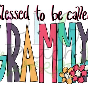 May include: A colorful graphic design with the text "Blessed to be called GRAMMY" in a whimsical font. The letters are outlined in black and filled with different colors, including teal, purple, yellow, and pink. There are three small flowers at the bottom of the design, in shades of pink, yellow, and orange.