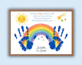 May include: A framed print featuring a watercolor rainbow, two blue handprints, a smiling yellow sun, and small stars. The text reads: Every rainbow shines, with colors so true, but my favorite treasure is Grandparents like you! Includes name Isabella and date 9/13/2026.