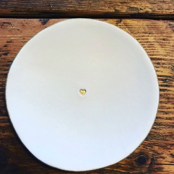 Handmade beautiful white trinket/jewellery dish with a small gold heart imprint and gold rim