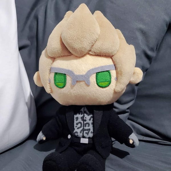 Peluche encantador de asesor con gafas
