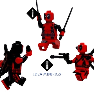 May include: Three red and black Lego minifigures of Deadpool, each with different accessories. The minifigures are posed in different action poses. The text "IDEA MINIFIGS" is printed on the white background.