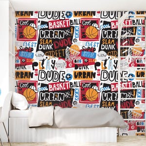 a bedroom with a basketball theme on the wall