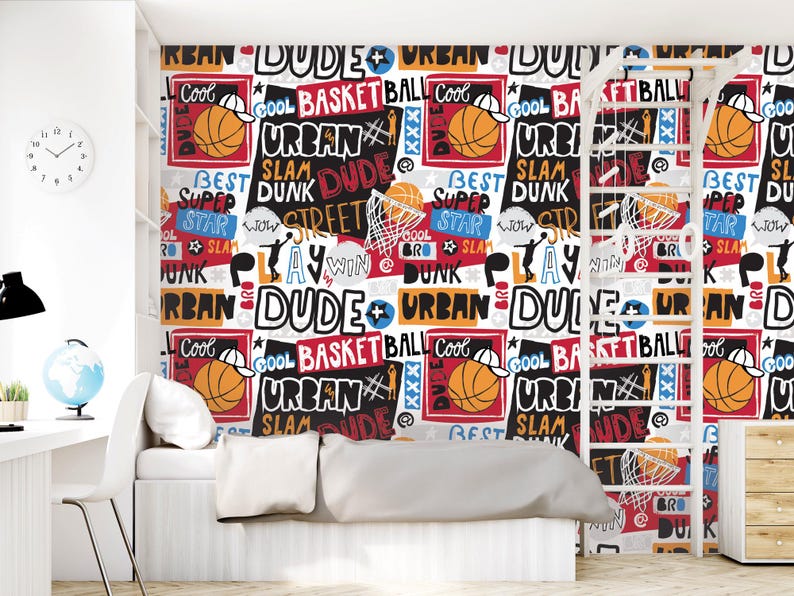 a bedroom with a basketball theme on the wall