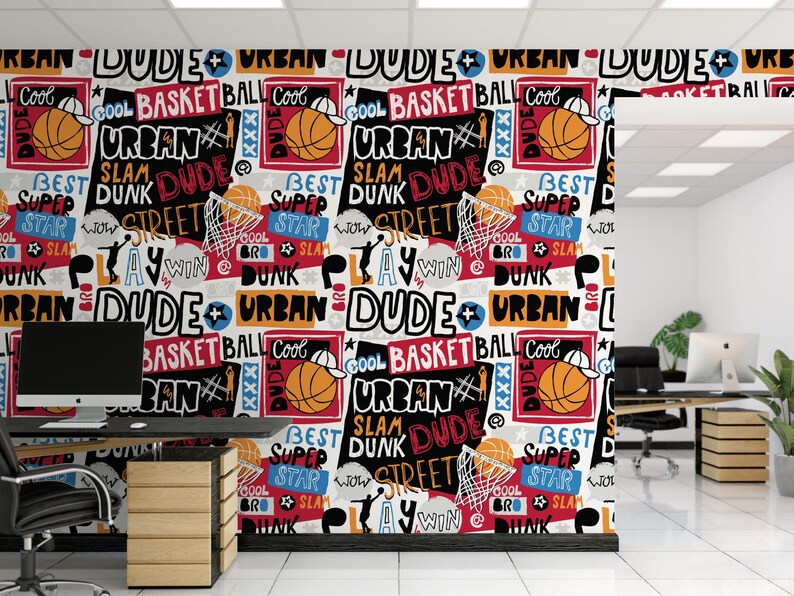 a room with a large mural of basketballs on the wall