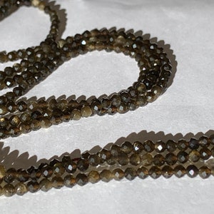 10 fasetterade 3 mm obsidianpärlor, 10 fasetterade guldobsidianpärlor, naturlig ädelsten, 3 mm, mörka toner med subtila gyllene glimtar.