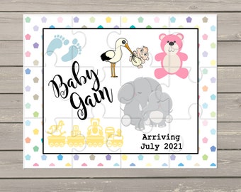 May include: A white puzzle piece with a colorful polka dot border. The puzzle features a stork carrying a baby, a pink teddy bear, a baby elephant, a train with toys, and the text "Baby Gain" and "Arriving July 2021".