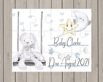 May include: A white bunny rabbit on a swing with a blue bow tie. A yellow star with a smiling face and a blue crescent moon with a closed eye are above a string of blue and white stars. The text "Baby Clarke Due August 2021" is below the stars.