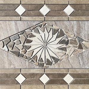 May include: Decorative tile with a geometric design. The tile features a central diamond shape with a starburst pattern, surrounded by smaller stone pieces. The border includes diamond and rectangular shapes in shades of brown and beige.