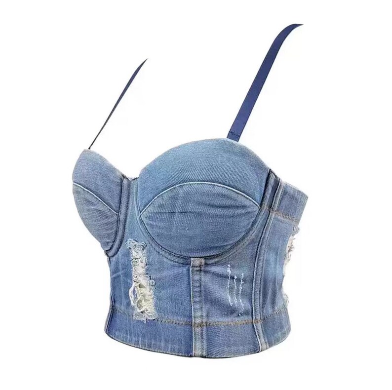 May include: A light blue denim corset top with adjustable straps and distressed detailing.