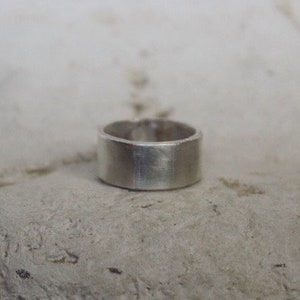 Wide smooth sterling silver ring