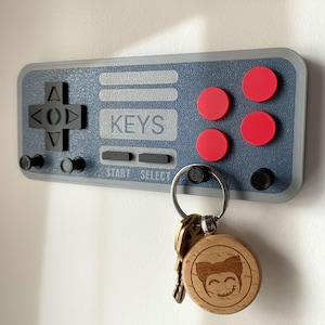 Chaveiro personalizado inspirado no controle do NES: Decoração de parede retrô para gamers, impresso em 3D
