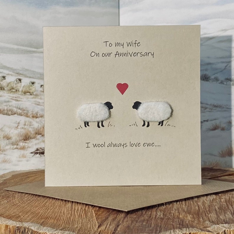 May include: A card with a sheep pun. It says "To my wife on our Anniversary. I wool always love ewe..." with two sheep looking at each other with a red heart between them.