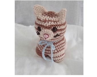 Carlos the little four-legged crocheted cat is ready for delivery, she needs you to cuddle and love