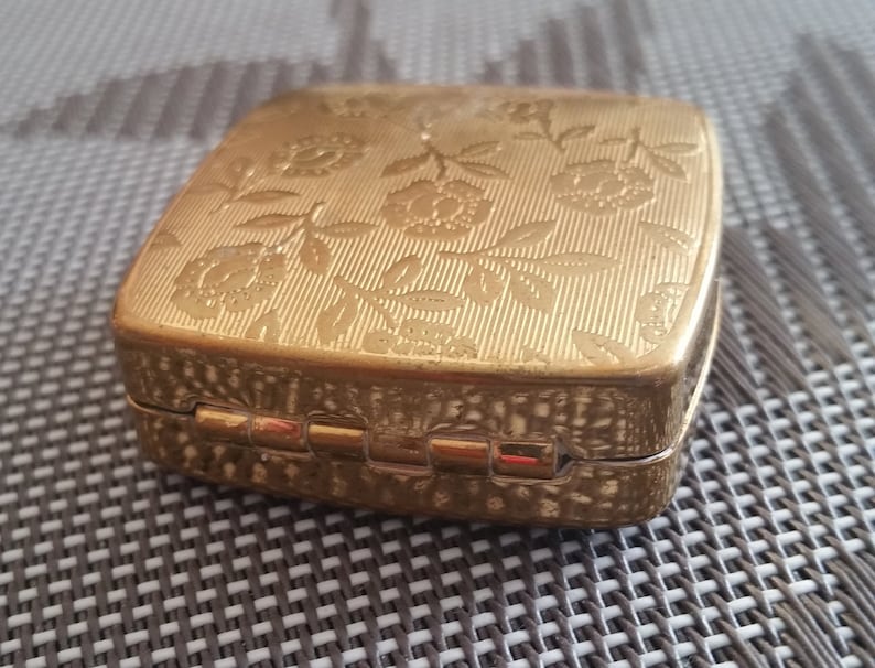 one of a kind. Beautifully decorated box on tablets