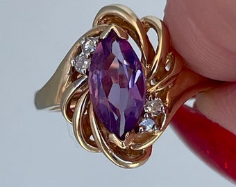 Amazing vintage but with a mod flair Amethyst and diamond Gold Ring
