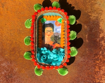 Santuario de pared hecho con una lata de sardinas de Frida Kahlo.