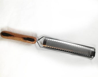 Hand turned grater with oak Irish whiskey barrel handle ideal for parmesan