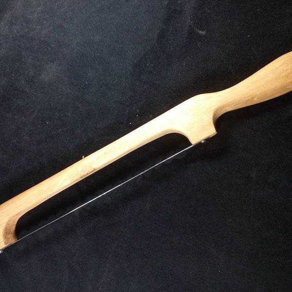 Oak fiddle bread knife, ideal for slicing newly baked bread